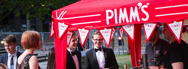 Picture of student around a Pimm's tent